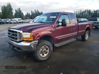 1999 Ford Super Duty F-250 XL with VIN 1FTNX21S4XED97271, listed as a Copart auction lot 83215054 with 87,055 mi miles and Clean Title. Bid and sale history available at carsss.com. Image 1.