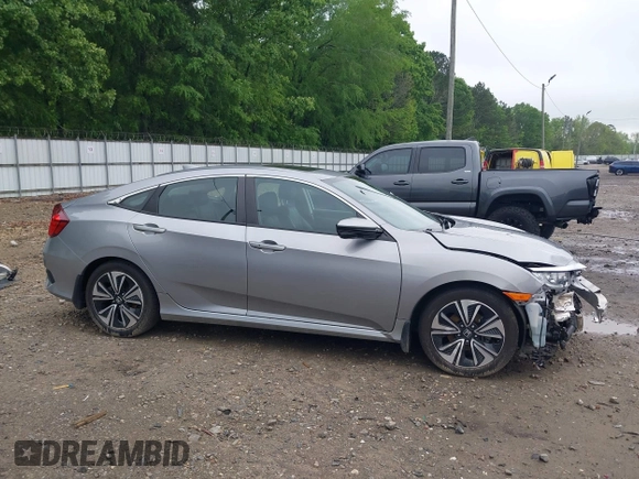 2017 Honda Civic EX-L z VIN 19XFC1F77HE026030, wystawiony jako IAAI lot #42112898 z przebiegiem 73 793 mil mil oraz . Historia ofert i sprzedaży dostępna na DreamBid. Obrazek 14.