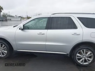 2013 Dodge Durango Crew z VIN 1C4RDJDGXDC637572, wystawiony jako IAAI lot #41922757 z przebiegiem 110 941 mil mil oraz . Historia ofert i sprzedaży dostępna na DreamBid. Obrazek 15.