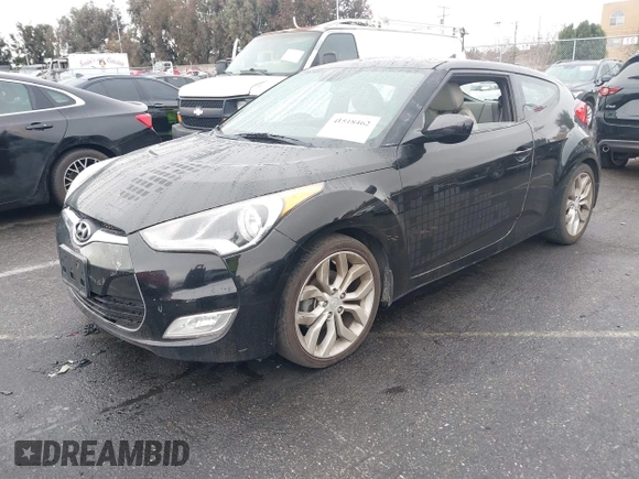 2013 Hyundai Veloster w/Gray Int with VIN KMHTC6AD6DU172892, listed as a IAAI auction lot 41518462 with 167,251 mi miles. Bid and sale history available at carsss.com. Image 2.