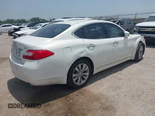 2011 Infiniti M with VIN JN1BY1AP5BM323980, listed as a IAAI auction lot 42293425 with 112,139 mi miles and . Bid and sale history available at DreamBid. Image 4.