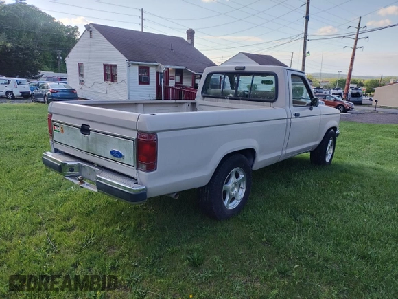 1990 Ford Ranger with VIN 1FTCR10T5LUB33370, listed as a Copart auction lot 56433285 with 110,895 mi miles and Clean title. Bid and sale history available at DreamBid. Image 4.