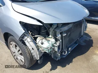 2017 Honda Fit LX with VIN JHMGK5H51HS023212, listed as a IAAI auction lot 42153107 with 106,778 mi miles. Bid and sale history available at carsss.com. Image 19.