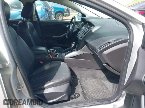 2014 Ford Focus SE with VIN 1FADP3F24EL323728, listed as a IAAI auction lot 41826974 with 141,357 mi miles and . Bid and sale history available at DreamBid. Image 5.