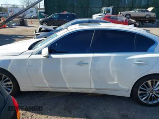 2019 Infiniti Q50 Luxe with VIN JN1EV7AR5KM594323, listed as a IAAI auction lot 42011023 with 68,235 mi miles and . Bid and sale history available at DreamBid. Image 14.