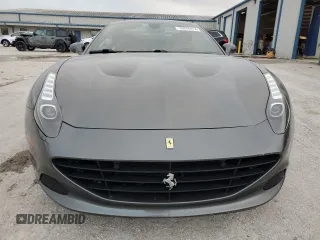 2015 Ferrari California T z VIN ZFF77XJA3F0206563, wystawiony jako Copart lot #78976914 z przebiegiem Nie podano mil oraz Szkody całkowita. Historia ofert i sprzedaży dostępna na DreamBid. Obrazek 5.
