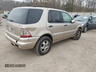 2002 Mercedes-Benz M 320/430/500 z VIN 4JGAB54E82A308902, wystawiony jako IAAI lot #41779482 z przebiegiem 99 933 mil mil oraz . Historia ofert i sprzedaży dostępna na DreamBid. Obrazek 4.