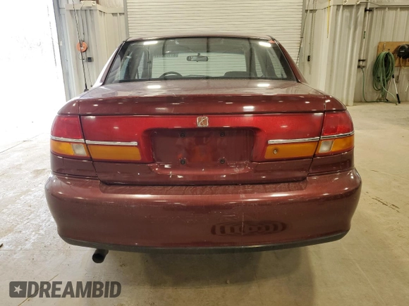 2001 Saturn LS z VIN 1G8JU52F51Y549021, wystawiony jako Copart lot #81109084 z przebiegiem 14 974 mil mil oraz Tytuł czysty. Historia ofert i sprzedaży dostępna na DreamBid. Obrazek 6.