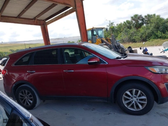 2016 Kia Sorento LX with VIN 5XYPG4A39GG090599, listed as a IAAI auction lot 42096430 with 126,595 mi miles. Bid and sale history available at carsss.com. Image 13.