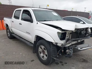 2014 Toyota Tacoma PreRunner z VIN 3TMJU4GN3EM170360, wystawiony jako IAAI lot #42438394 z przebiegiem 223 101 mil mil oraz . Historia ofert i sprzedaży dostępna na DreamBid. Obrazek 1.