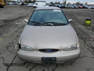 1996 Ford Contour с VIN 3FALP6535TM129390, выставлен на аукционе Copart как лот 73338064 с пробегом 87 588 миль миль и Списание • Salvage title. История ставок и продаж доступна на DreamBid. Изображение 5.