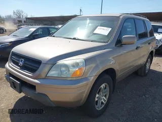 2004 Honda Pilot EX with VIN 2HKYF18464H599512, listed as a IAAI auction lot 42098213 with 224,054 mi miles and . Bid and sale history available at DreamBid. Image 2.
