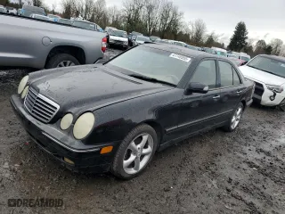 2001 Mercedes-Benz E-Class with VIN WDBJF70J31B324620, listed as a Copart auction lot 47748555 with 160,041 mi miles and Salvage Title. Bid and sale history available at carsss.com. Image 1.