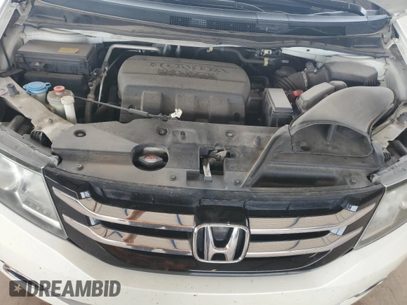 2017 Honda Odyssey Touring with VIN 5FNRL5H94HB007979, listed as a Copart auction lot 56755435 with 125,821 mi miles and Salvage title. Bid and sale history available at DreamBid. Image 12.