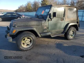2002 Jeep Wrangler Sahara z VIN 1J4FA59S12P757177, wystawiony jako Copart lot #42808925 z przebiegiem 71 049 mil mil oraz Czysty tytuł • Clean title. Historia ofert i sprzedaży dostępna na DreamBid. Obrazek 1.