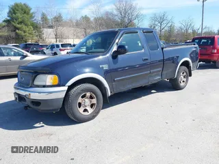 2001 Ford F-150 XL with VIN 2FTRX18L01CA83673, listed as a IAAI auction lot 41943618 with 130,717 mi miles. Bid and sale history available at carsss.com. Image 2.
