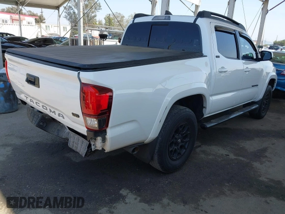 2020 Toyota Tacoma SR5 with VIN 3TMAZ5CN8LM118099, listed as a IAAI auction lot 42462393 with 44,795 mi miles and . Bid and sale history available at DreamBid. Image 4.