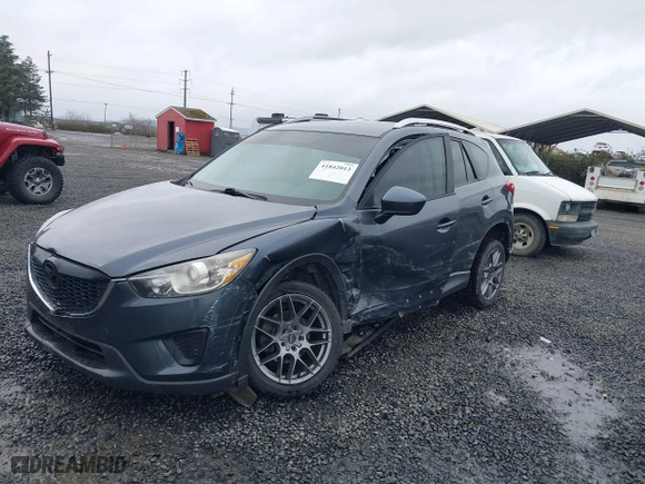 2013 Mazda CX-5 Sport with VIN JM3KE2BE7D0154040, listed as a IAAI auction lot 41842013 with 132,382 mi miles. Bid and sale history available at carsss.com. Image 2.