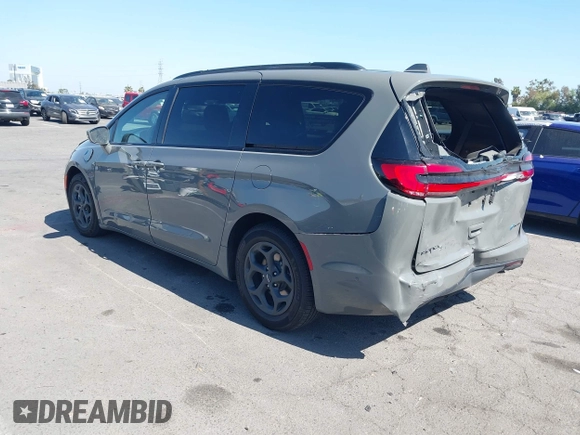 2021 Chrysler Pacifica Hybrid Limited z VIN 2C4RC1S76MR544495, wystawiony jako IAAI lot #42294312 z przebiegiem 89 083 mil mil oraz . Historia ofert i sprzedaży dostępna na DreamBid. Obrazek 3.