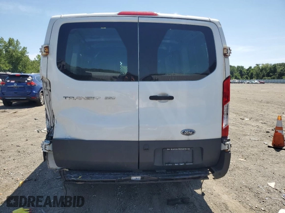 2015 Ford Transit Cargo z VIN 1FTNR1ZM1FKB05215, wystawiony jako Copart lot #62349495 z przebiegiem 154 057 mil mil oraz Czysty tytuł • Clean title. Historia ofert i sprzedaży dostępna na DreamBid. Obrazek 6.