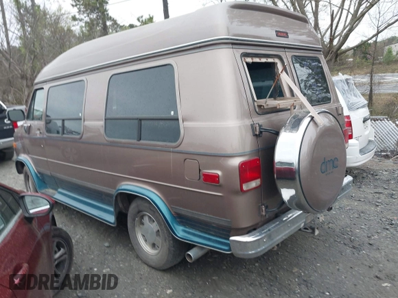 1995 Chevrolet Chevy Van z VIN 1GBEG25K8SF245639, wystawiony jako IAAI lot #41917862 z przebiegiem 89 015 mil mil oraz . Historia ofert i sprzedaży dostępna na DreamBid. Obrazek 3.
