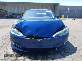 2017 Tesla Model S 100D with VIN 5YJSA1E44HF220391, listed as a IAAI auction lot 37381201 with Not Provided miles and . Bid and sale history available at DreamBid. Image 12.