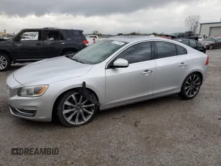 2015 Volvo S60 T6 Drive-E Platinum with VIN YV149MFMXF2335458, listed as a Copart auction lot 80777934 with 140,790 mi miles and Salvage title. Bid and sale history available at DreamBid. Image 1.