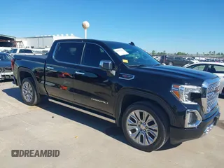 2022 GMC Sierra 1500 Denali with VIN 3GTU9FEL1NG121846, listed as a IAAI auction lot 40907226 with 56,198 mi miles and . Bid and sale history available at DreamBid. Image 1.
