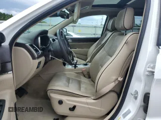 2015 Jeep Grand Cherokee Overland with VIN 1C4RJFCGXFC891616, listed as a Copart auction lot 61386065 with 90,011 mi miles and Salvage title. Bid and sale history available at DreamBid. Image 7.