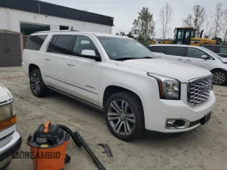 2019 GMC Yukon XL Denali with VIN 1GKS1HKJ1KR203895, listed as a Copart auction lot 74622754 with 51,559 mi miles and Salvage Title. Bid and sale history available at carsss.com. Image 4.
