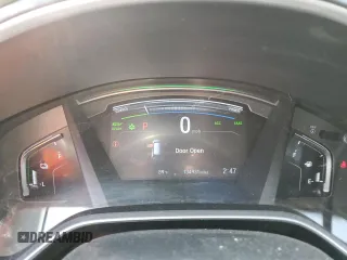2020 Honda CR-V Touring z VIN 7FART6H93LE013954, wystawiony jako Copart lot #56970555 z przebiegiem 134 931 mil mil oraz Szkoda całkowita • Salvage title. Historia ofert i sprzedaży dostępna na DreamBid. Obrazek 9.