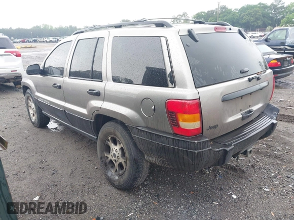 1999 Jeep Grand Cherokee Laredo with VIN 1J4G258SXXC518647, listed as a IAAI auction lot 42124724 with 229,668 mi miles and . Bid and sale history available at DreamBid. Image 3.