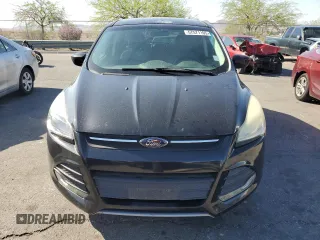 2014 Ford Escape SE z VIN 1FMCU9G9XEUB47481, wystawiony jako Copart lot #57571105 z przebiegiem 153 943 mil mil oraz Czysty tytuł • Clean title. Historia ofert i sprzedaży dostępna na DreamBid. Obrazek 5.