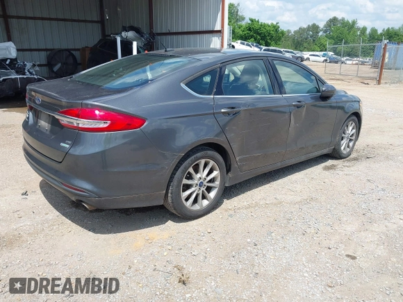 2017 Ford Fusion SE with VIN 3FA6P0HD7HR297945, listed as a IAAI auction lot 42015135 with 136,774 mi miles. Bid and sale history available at carsss.com. Image 4.