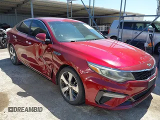 2019 Kia Optima LX z VIN 5XXGT4L33KG360559, wystawiony jako IAAI lot #41977891 z przebiegiem 88 277 mil mil oraz . Historia ofert i sprzedaży dostępna na DreamBid. Obrazek 1.