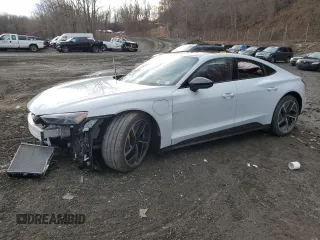 2024 Audi RS e-tron GT z VIN WAUBHBFW7R7901666, wystawiony jako Copart lot #86443564 z przebiegiem Nie podano mil oraz Szkody całkowita. Historia ofert i sprzedaży dostępna na DreamBid. Obrazek 1.