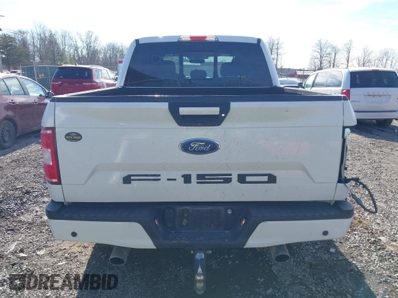 2018 Ford F-150 XL with VIN 1FTEW1E5XJFE20779, listed as a IAAI auction lot 41705616 with 138,996 mi miles and . Bid and sale history available at DreamBid. Image 16.