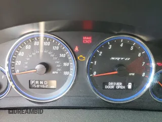 2008 Jeep Grand Cherokee SRT-8 with VIN 1J8HR78378C221985, listed as a Copart auction lot 76872364 with 158,462 mi miles and Clean Title. Bid and sale history available at carsss.com. Image 9.