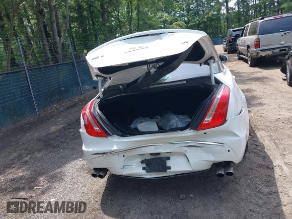 2014 Jaguar XJ with VIN SAJWA2EK8EMV67443, listed as a IAAI auction lot 42483075 with 88,357 mi miles and . Bid and sale history available at DreamBid. Image 16.