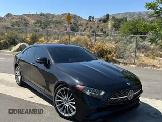 2022 Mercedes-Benz CLS 450 с VIN W1K2J5KB2NA105261, выставлен на аукционе Copart как лот 58268425 с пробегом 2 695 миль миль и Чистый • Clean title. История ставок и продаж доступна на DreamBid. Изображение 1.