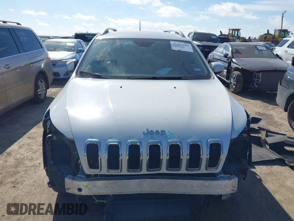 2016 Jeep Cherokee Limited with VIN 1C4PJLDB8GW256788, listed as a IAAI auction lot 41657339 with 104,630 mi miles. Bid and sale history available at carsss.com. Image 12.