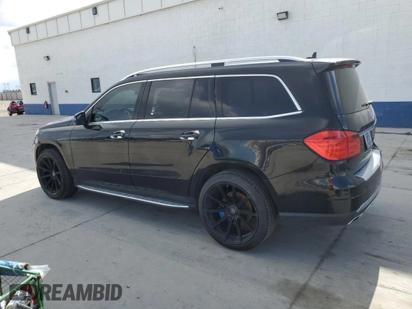 2013 Mercedes-Benz GL 450 z VIN 4JGDF7CE0DA251791, wystawiony jako Copart lot #51180575 z przebiegiem 175 989 mil mil oraz Szkoda całkowita • Salvage title. Historia ofert i sprzedaży dostępna na DreamBid. Obrazek 2.