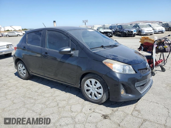 2012 Toyota Yaris L with VIN JTDKTUD34CD505077, listed as a Copart auction lot 63422445 with 141,067 mi miles and Salvage title. Bid and sale history available at DreamBid. Image 4.