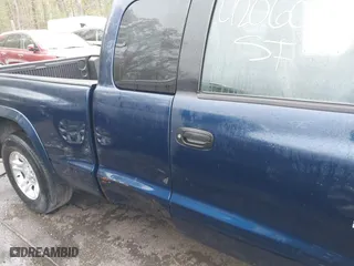 2002 Dodge Dakota Sport with VIN 1B7GL32X12S561414, listed as a IAAI auction lot 42060300 with 235,957 mi miles. Bid and sale history available at carsss.com. Image 6.