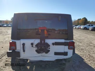 2018 Jeep Wrangler JK Unlimited Sport S with VIN 1C4BJWDG2JL879078, listed as a Copart auction lot 84290864 with 24,457 mi miles and Salvage Title. Bid and sale history available at carsss.com. Image 6.
