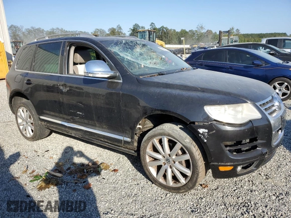 2010 Volkswagen Touareg VR6 with VIN WVGBF7A92AD002237, listed as a Copart auction lot 73919754 with 124,072 mi miles and Salvage Title. Bid and sale history available at DreamBid. Image 4.