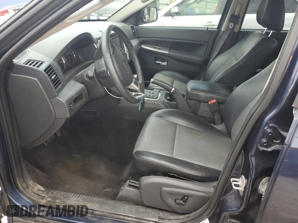 2009 Jeep Grand Cherokee Laredo with VIN 1J8HR48P49C545334, listed as a Copart auction lot 71562344 with 183,976 mi miles and Salvage Title. Bid and sale history available at carsss.com. Image 7.