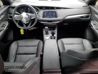 2022 Cadillac XT4 AWD Premium Luxury with VIN 1GYFZDR42NF147920, listed as a Copart auction lot 84058554 with 12,145 mi miles and Salvage Title. Bid and sale history available at carsss.com. Image 8.