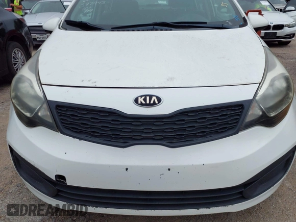 2014 Kia Rio LX with VIN KNADM4A3XE6384733, listed as a IAAI auction lot 42196921 with 153,084 mi miles and . Bid and sale history available at DreamBid. Image 6.