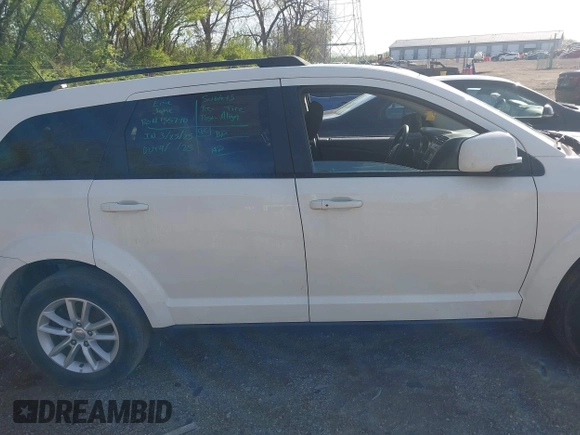 2017 Dodge Journey SXT z VIN 3C4PDCBG9HT589904, wystawiony jako IAAI lot #42084994 z przebiegiem 130 194 mil mil oraz . Historia ofert i sprzedaży dostępna na DreamBid. Obrazek 13.